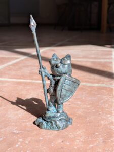 A bronze sculpture of the Pink Cat as a Knight