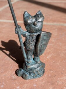 A bronze sculpture of the Pink Cat as a Knight